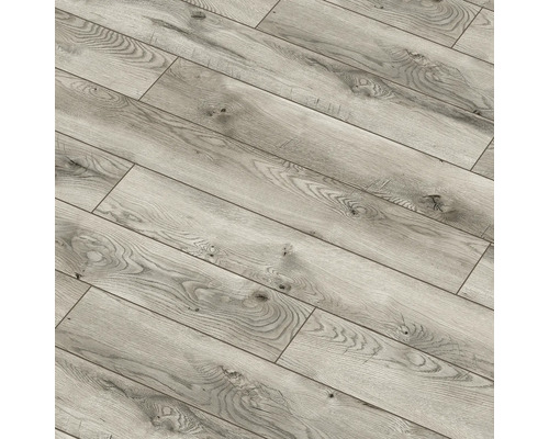 Prim-plan cu parchet laminat deschis la culoare, cu aspect de lemn