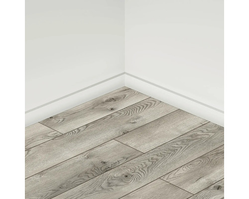 Colț de cameră cu podea laminată cu aspect de lemn