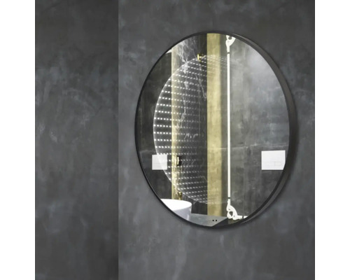 Oglindă rotundă cu iluminare pentru montaj pe perete în baie.