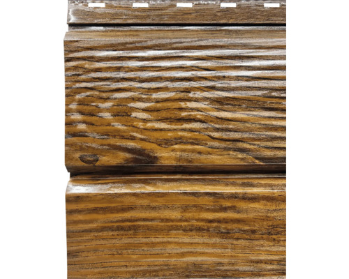 Set sageac Bravo 3000x260x0,4 mm perforat stejar auriu (10 bucăți) Prim-plan cu un placaj de fațadă cu aspect de lemn.