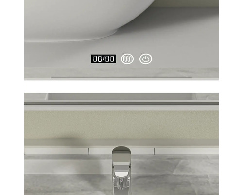 Prim-plan al unei oglinzi de baie cu afișaj digital pentru oră, simbol de încălzire și buton de pornire/oprire