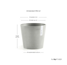 Ghiveci gri Amsterdam Mini 17 de la ECOPOTS. Dimensiuni: înălțime 14,7 centimetri, diametru exterior 17 centimetri, diametru interior 15,4 centimetri.