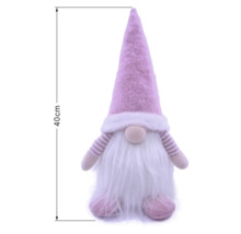 Spiriduș decorativ roz cu barbă albă și căciulă ascuțită, înălțime 40 centimetri.