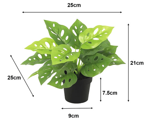 Monstera artificială în ghiveci de plastic negru, lățime 25 centimetri, înălțime 21 centimetri, adâncime 25 centimetri.